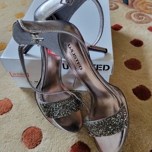 NEW UNLISTED HEELS 7.5 PEWTER